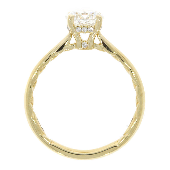 14K Yellow Gold Solitaire Engagement Ring With A Diamond Accented Under-gallery Halo and Quilted Interior