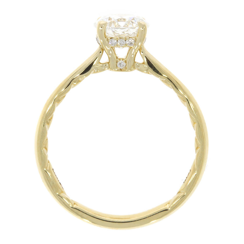 14K Yellow Gold Solitaire Engagement Ring With A Diamond Accented Under-gallery Halo and Quilted Interior