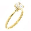 14K Yellow Gold Solitaire Engagement Ring With A Diamond Accented Under-gallery Halo and Quilted Interior