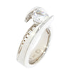 18k White Gold and Diamond Ring With Round Cut Diamond Accents Below Tall Bypass