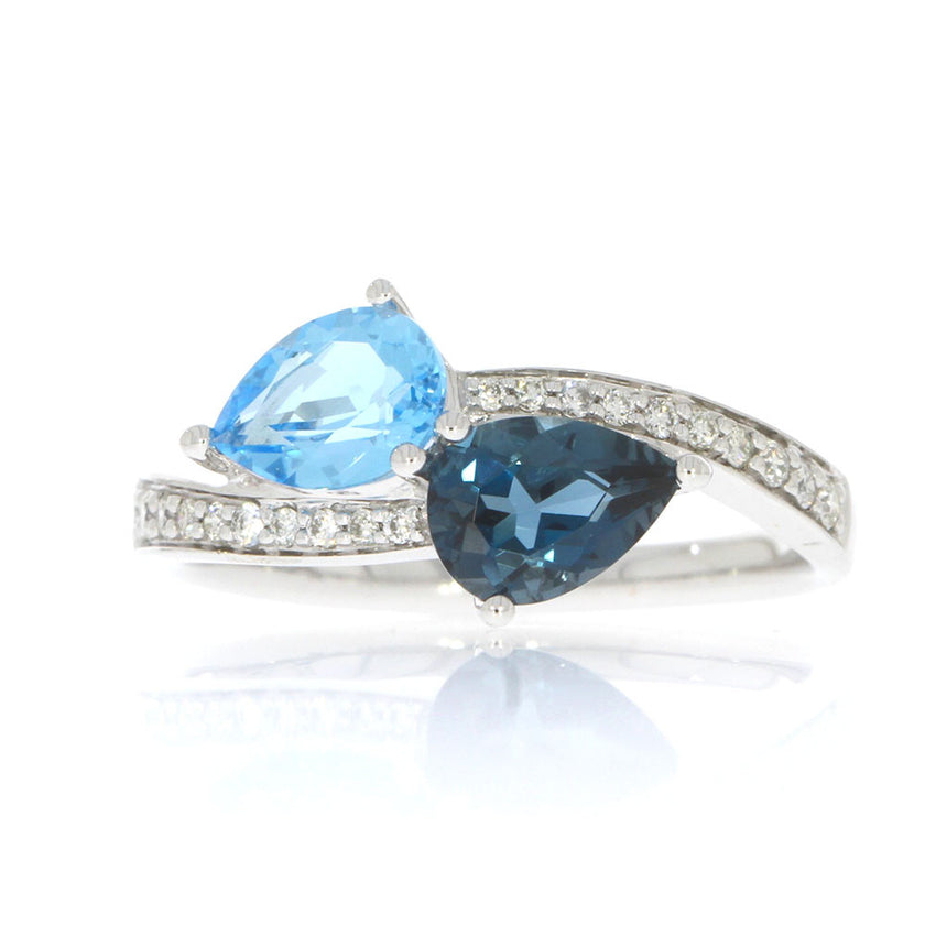 14K White Gold and Pear Shape Blue Topaz Bypass Style Ring, with Prong Set Round Diamond Accented Band