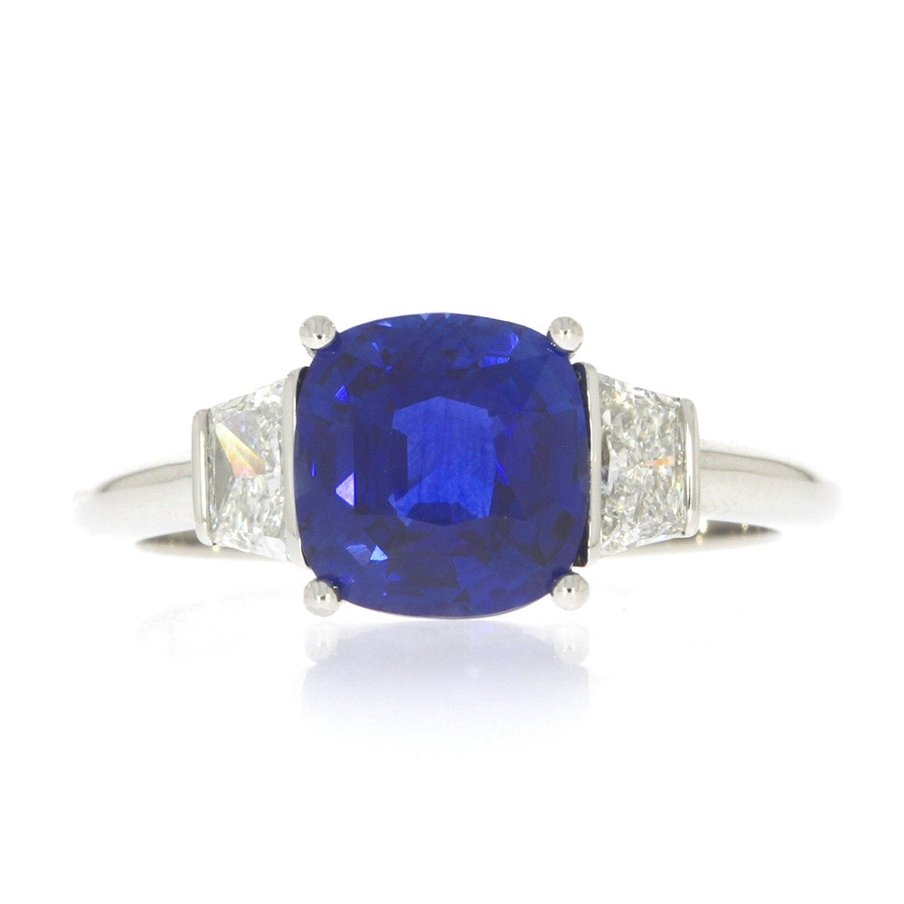 Platinum Cushion Cut Blue Sapphire and Trapezoid Diamond Three Stone Ring
