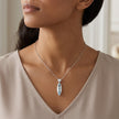 Sterling Silver Bezel Set Marquise Blue Topaz Pendant, with White Sapphire Accented Bail