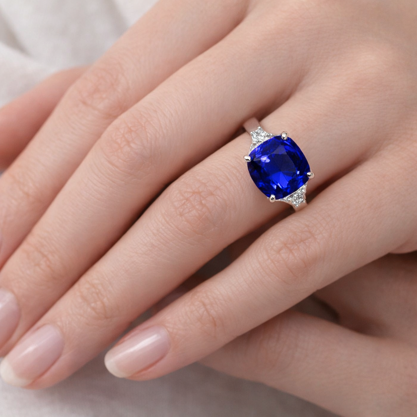 Platinum And Cushion Cut Natural Blue Sapphire And Natural Trapezoid Diamond Three Stone Ring
