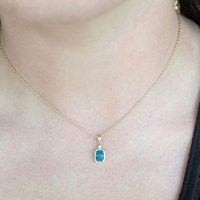 14K Yellow Gold Bezel Set Rectangular Cushion Cut Blue Zircon Pendant, with Bezel Set Diamond Accent